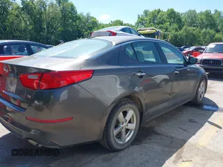 2015 Kia Optima LX z VIN 5XXGM4A77FG356930, wystawiony jako IAAI lot #42261299 z przebiegiem 248 635 mil mil oraz . Historia ofert i sprzedaży dostępna na DreamBid. Obrazek 4.