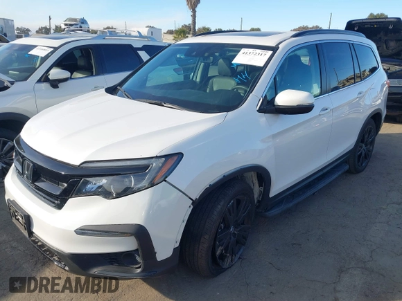 2022 Honda Pilot Special Edition with VIN 5FNYF5H20NB034677, listed as a IAAI auction lot 41372317 with 28,708 mi miles and . Bid and sale history available at carsss.com. Image 18.