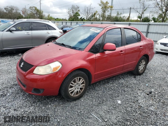 2012 Suzuki SX4 LE with VIN JS2YC5A39C6300577, listed as a Copart auction lot 86998944 with 103,354 mi miles and Non Repairable. Bid and sale history available at carsss.com. Image 1.