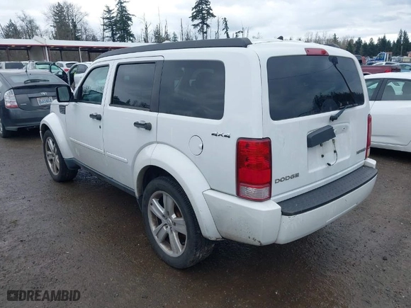 2011 Dodge Nitro Heat with VIN 1D4PU4GK9BW598044, listed as a IAAI auction lot 41863209 with 126,335 mi miles. Bid and sale history available at carsss.com. Image 3.