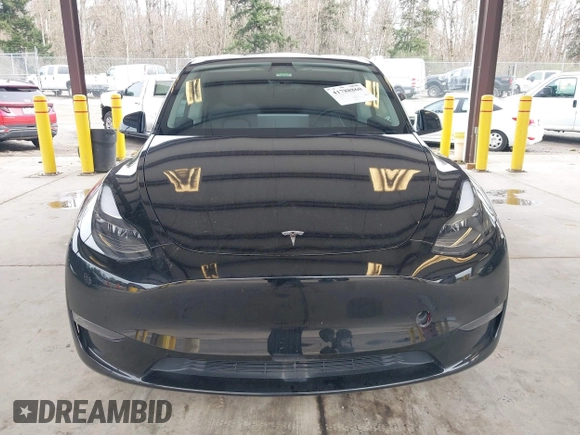 2023 Tesla Model Y Long Range with VIN 7SAYGDEE4PF789102, listed as a IAAI auction lot 41788860 with 88,457 mi miles and . Bid and sale history available at DreamBid. Image 12.