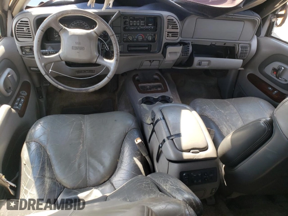 2000 GMC Denali z VIN 1GKEK13R2YR138523, wystawiony jako Copart lot #77609804 z przebiegiem 203 514 mil mil oraz Szkody całkowita. Historia ofert i sprzedaży dostępna na DreamBid. Obrazek 8.