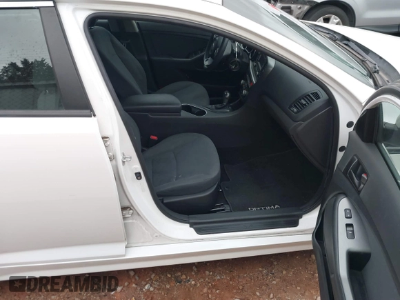 2015 Kia Optima LX with VIN KNAGM4A74F5587415, listed as a IAAI auction lot 41184428 with 128,549 mi miles. Bid and sale history available at carsss.com. Image 5.