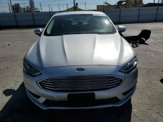 2018 Ford Fusion Hybrid S with VIN 3FA6P0UU7JR122848, listed as a Copart auction lot 46677155 with 75,932 mi miles and Salvage Title. Bid and sale history available at carsss.com. Image 5.