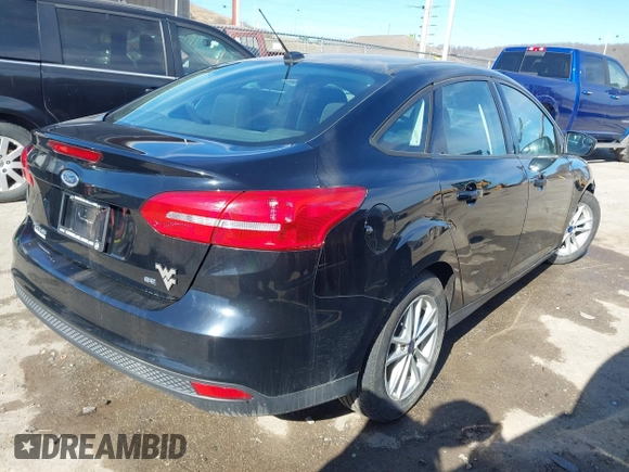 2016 Ford Focus SE with VIN 1FADP3F29GL304823, listed as a IAAI auction lot 41720924 with 82,245 mi miles. Bid and sale history available at carsss.com. Image 4.