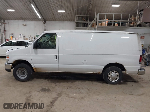 2013 Ford Econoline Cargo Commercial with VIN 1FTNE1EW6DDA04241, listed as a IAAI auction lot 42503937 with 167,333 mi miles and . Bid and sale history available at DreamBid. Image 14.