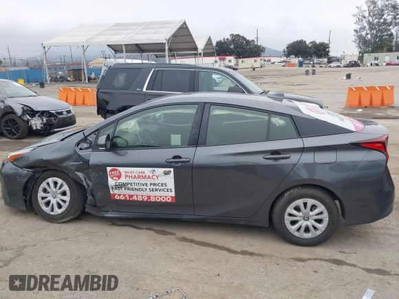 2022 Toyota Prius L Eco with VIN JTDKAMFU3N3190079, listed as a IAAI auction lot 41771356 with 52,607 mi miles and . Bid and sale history available at DreamBid. Image 14.
