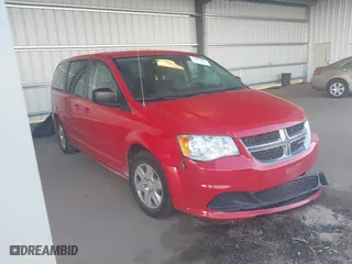 2012 Dodge Grand Caravan SE with VIN 2C4RDGBG0CR157374, listed as a IAAI auction lot 40502846 with 112,079 mi miles. Bid and sale history available at carsss.com. Image 1.