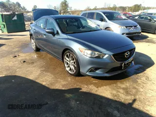 2015 Mazda 6 i Grand Touring with VIN JM1GJ1W57F1221764, listed as a IAAI auction lot 41826443 with 138,648 mi miles. Bid and sale history available at carsss.com. Image 1.