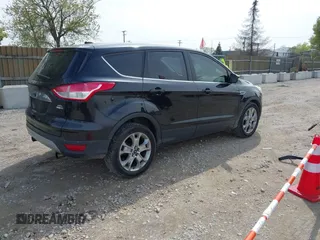 2013 Ford Escape SEL with VIN 1FMCU9H92DUA45282, listed as a IAAI auction lot 42184946 with 96,512 mi miles and . Bid and sale history available at DreamBid. Image 4.