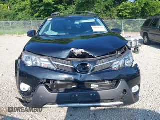 2014 Toyota RAV4 Limited with VIN 2T3DFREV5EW187988, listed as a IAAI auction lot 42694259 with 124,859 mi miles and . Bid and sale history available at DreamBid. Image 12.