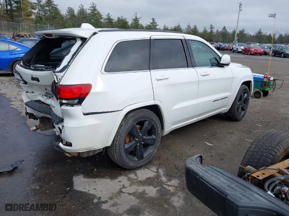 2015 Jeep Grand Cherokee Altitude with VIN 1C4RJFAG4FC942885, listed as a IAAI auction lot 41952356 with 233,276 mi miles. Bid and sale history available at carsss.com. Image 4.