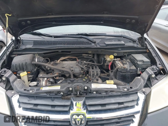 2010 Dodge Grand Caravan SXT z VIN 2D4RN5D12AR444953, wystawiony jako IAAI lot #42247277 z przebiegiem 214 387 mil mil oraz . Historia ofert i sprzedaży dostępna na DreamBid. Obrazek 10.