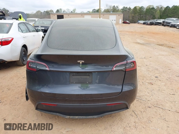 2024 Tesla Model Y with VIN 7SAYGDED3RA303113, listed as a IAAI auction lot 41915760 with 12,917 mi miles and . Bid and sale history available at DreamBid. Image 15.
