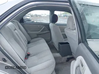 2000 Toyota Camry CE z VIN 4T1BG22K3YU691054, wystawiony jako IAAI lot #41896526 z przebiegiem 303 993 mil mil oraz . Historia ofert i sprzedaży dostępna na DreamBid. Obrazek 8.