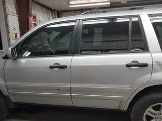 2005 Honda Pilot EX-L with VIN 5FNYF18575B064830, listed as a IAAI auction lot 41825259 with 250,467 mi miles. Bid and sale history available at carsss.com. Image 15.