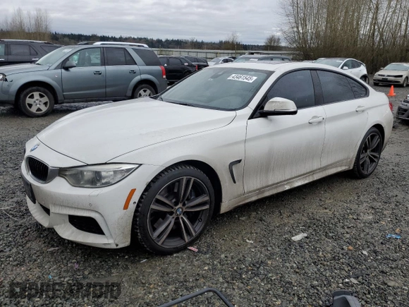 2015 BMW 4 Series 435i xDrive with VIN WBA4B3C56FD669599, listed as a Copart auction lot 43461545 with 186,082 mi miles and Salvage title. Bid and sale history available at DreamBid. Image 1.