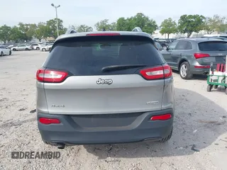 2014 Jeep Cherokee Altitude with VIN 1C4PJMCB4EW107556, listed as a IAAI auction lot 41881448 with 212,816 mi miles and . Bid and sale history available at carsss.com. Image 17.