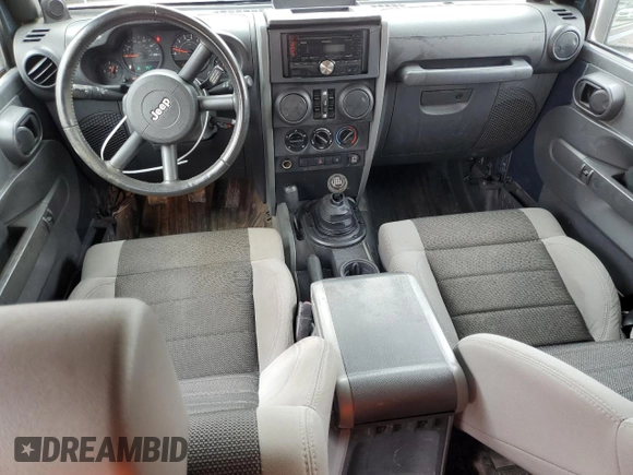 2007 Jeep Wrangler Unlimited X with VIN 1J8GA39107L105101, listed as a Copart auction lot 88559675 with 213,902 mi miles and Salvage title. Bid and sale history available at DreamBid. Image 8.