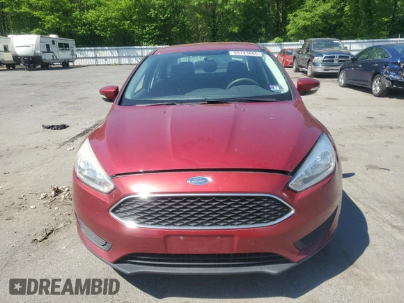 2017 Ford Focus SE with VIN 1FADP3F23HL274056, listed as a Copart auction lot 55743865 with 52,790 mi miles and Salvage title. Bid and sale history available at DreamBid. Image 5.