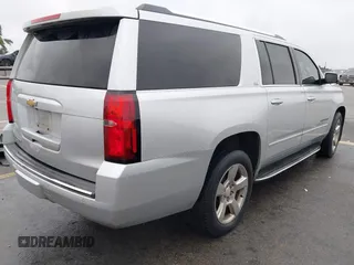 2015 Chevrolet Suburban LTZ with VIN 1GNSCKKC1FR507665, listed as a IAAI auction lot 41517753 with 162,604 mi miles. Bid and sale history available at carsss.com. Image 4.