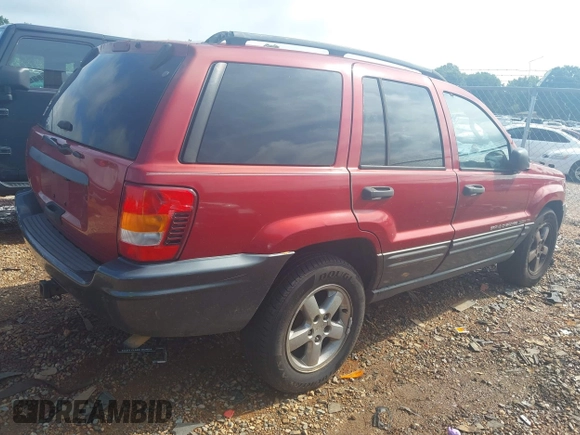 2004 Jeep Grand Cherokee Laredo with VIN 1J4GW48S34C419596, listed as a IAAI auction lot 42515494 with 276,196 mi miles and . Bid and sale history available at DreamBid. Image 4.