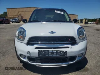 2016 MINI Countryman S with VIN WMWZC5C51GWU00690, listed as a Copart auction lot 55077095 with 104,176 mi miles and Salvage title. Bid and sale history available at DreamBid. Image 5.
