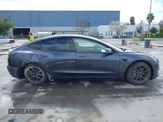 2022 Tesla Model 3 Long Range with VIN 5YJ3E1EB0NF259904, listed as a IAAI auction lot 41826642 with 42,272 mi miles and . Bid and sale history available at DreamBid. Image 13.