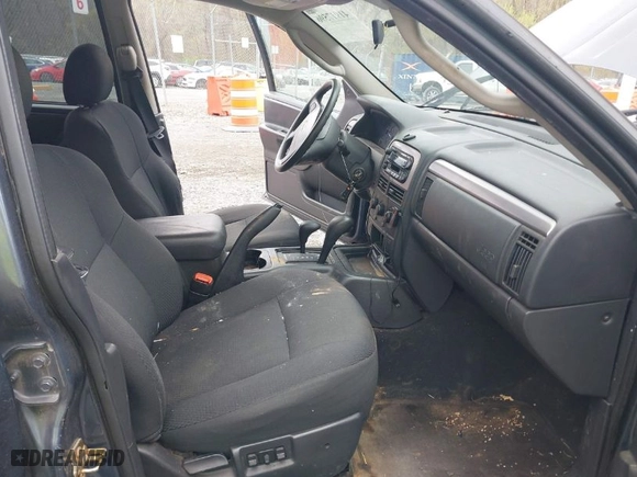 2004 Jeep Grand Cherokee Laredo with VIN 1J4GW48S94C343365, listed as a IAAI auction lot 41917596 with 170,957 mi miles. Bid and sale history available at carsss.com. Image 5.