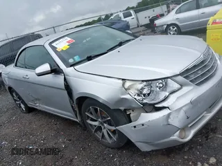 2010 Chrysler Sebring Limited with VIN 1C3BC6EV1AN122513, listed as a IAAI auction lot 42352348 with 128,386 mi miles and . Bid and sale history available at DreamBid. Image 1.