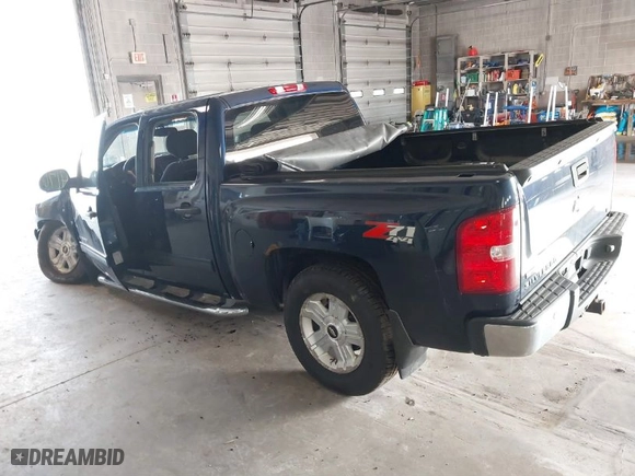 2011 Chevrolet Silverado 1500 LT with VIN 3GCPKSE37BG296592, listed as a IAAI auction lot 41768810 with 151,277 mi miles. Bid and sale history available at carsss.com. Image 3.