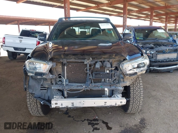 2017 Toyota Tacoma SR5 z VIN 3TMCZ5AN0HM110825, wystawiony jako IAAI lot #42297408 z przebiegiem 126 769 mil mil oraz . Historia ofert i sprzedaży dostępna na DreamBid. Obrazek 12.