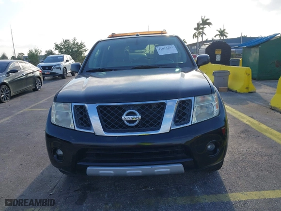 2012 Nissan Pathfinder LE with VIN 5N1AR1NN5CC607403, listed as a IAAI auction lot 41813677 with 217,854 mi miles. Bid and sale history available at carsss.com. Image 12.