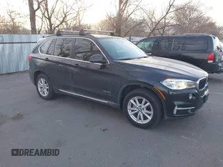 2015 BMW X5 xDrive35i with VIN 5UXKR0C59F0K59728, listed as a IAAI auction lot 41701083 with 83,267 mi miles. Bid and sale history available at carsss.com. Image 1.