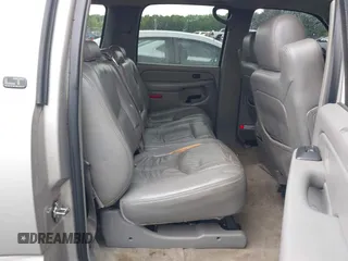 2005 Chevrolet Suburban LT z VIN 3GNEC16ZX5G197892, wystawiony jako IAAI lot #42045100 z przebiegiem 262 665 mil mil oraz . Historia ofert i sprzedaży dostępna na DreamBid. Obrazek 8.