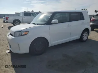 2015 Scion xB with VIN JTLZE4FE3FJ074345, listed as a Copart auction lot 41630825 with 128,856 mi miles and Salvage Title. Bid and sale history available at carsss.com. Image 1.