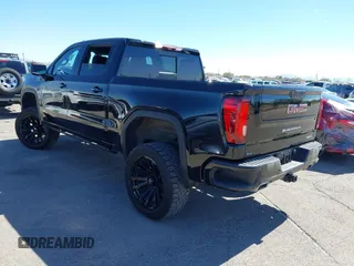 2021 GMC Sierra 1500 AT4 with VIN 3GTP9EED5MG206008, listed as a IAAI auction lot 41665423 with 61,685 mi miles. Bid and sale history available at carsss.com. Image 3.