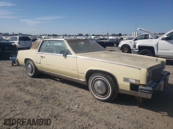 1982 Cadillac Eldorado z VIN 1G6AL578XCE608090, wystawiony jako Copart lot #73839654 z przebiegiem 22 185 mil mil oraz Czysty tytuł • Clean title. Historia ofert i sprzedaży dostępna na DreamBid. Obrazek 4.