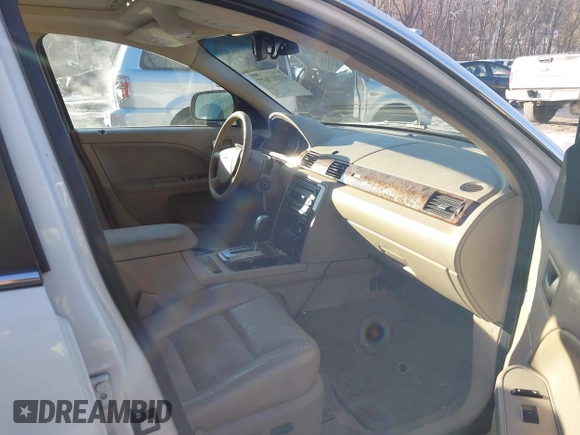 2006 Ford Five Hundred SEL with VIN 1FAHP27156G105454, listed as a IAAI auction lot 41317677 with 1 mi miles. Bid and sale history available at carsss.com. Image 5.