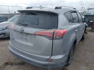 2016 Toyota RAV4 LE with VIN 2T3ZFREV4GW306588, listed as a IAAI auction lot 41686915 with 188,615 mi miles and . Bid and sale history available at DreamBid. Image 4.