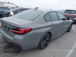 2022 BMW 5 Series M550i xDrive with VIN WBA13BK07NCL07995, listed as a IAAI auction lot 42454963 with 12,721 mi miles and . Bid and sale history available at DreamBid. Image 4.