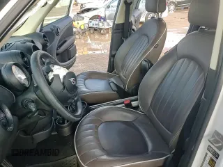 2014 MINI Countryman S z VIN WMWZC3C50EWP29415, wystawiony jako Copart lot #55579045 z przebiegiem 102 151 mil mil oraz Szkoda całkowita • Salvage title. Historia ofert i sprzedaży dostępna na DreamBid. Obrazek 14.
