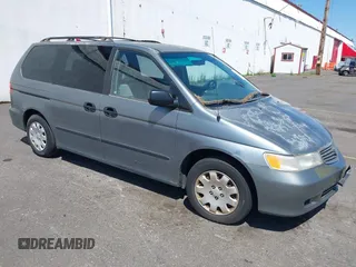 2001 Honda Odyssey LX z VIN 2HKRL185X1H521719, wystawiony jako IAAI lot #42374843 z przebiegiem 211 907 mil mil oraz . Historia ofert i sprzedaży dostępna na DreamBid. Obrazek 1.