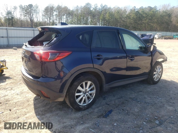 2013 Mazda CX-5 Touring with VIN JM3KE2CE0D0142102, listed as a Copart auction lot 51223575 with Not Provided miles and Salvage Title. Bid and sale history available at DreamBid. Image 3.
