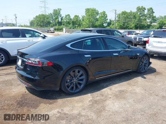 2013 Tesla Model S Performance with VIN 5YJSA1CP5DFP25346, listed as a IAAI auction lot 42463047 with 112,909 mi miles and . Bid and sale history available at DreamBid. Image 4.