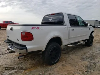 2002 Ford F-150 XLT with VIN 1FTRW08682KC80529, listed as a Copart auction lot 37546994 with 159,980 mi miles and Salvage Title. Bid and sale history available at carsss.com. Image 3.