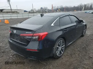 2024 Honda Civic Touring z VIN 2HGFE1F97RH316075, wystawiony jako Copart lot #50006805 z przebiegiem Nie podano mil oraz Szkoda całkowita • Salvage title. Historia ofert i sprzedaży dostępna na DreamBid. Obrazek 3.