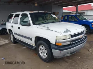 2004 Chevrolet Tahoe LT with VIN 1GNEC13ZX4J131652, listed as a IAAI auction lot 41551921 with 395,802 mi miles. Bid and sale history available at carsss.com. Image 1.