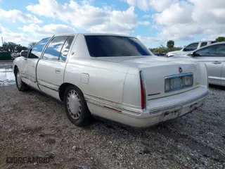 1999 Cadillac DeVille with VIN 1G6KD54Y2XU785069, listed as a IAAI auction lot 41630447 with 137,007 mi miles. Bid and sale history available at carsss.com. Image 3.