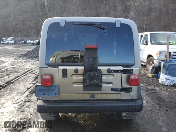2004 Jeep Wrangler Sport z VIN 1J4FA49SX4P723705, wystawiony jako Copart lot #46944215 z przebiegiem 157 731 mil mil oraz Czysty tytuł • Clean title. Historia ofert i sprzedaży dostępna na DreamBid. Obrazek 6.